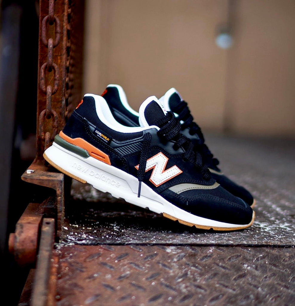 new Ba1an*e trainers black white orange gum bott0m